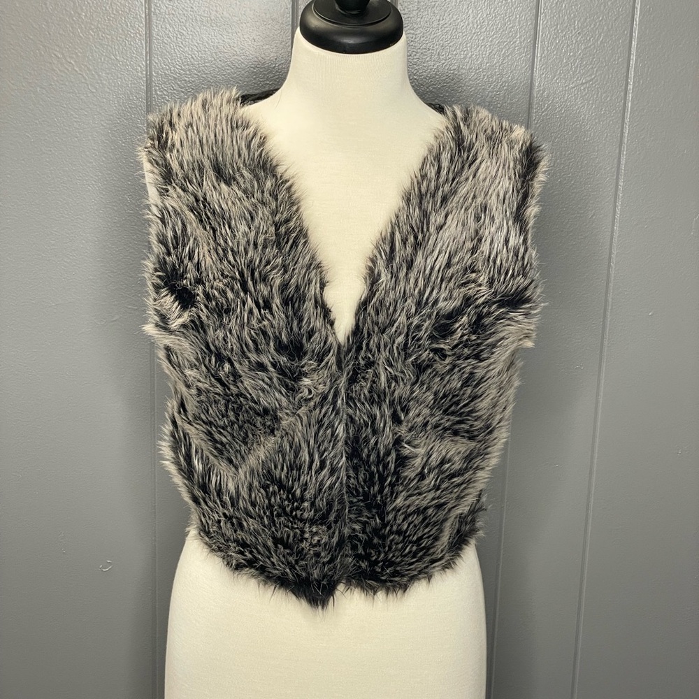 Vintage Love Rocks fur vest with open back. Size medium.